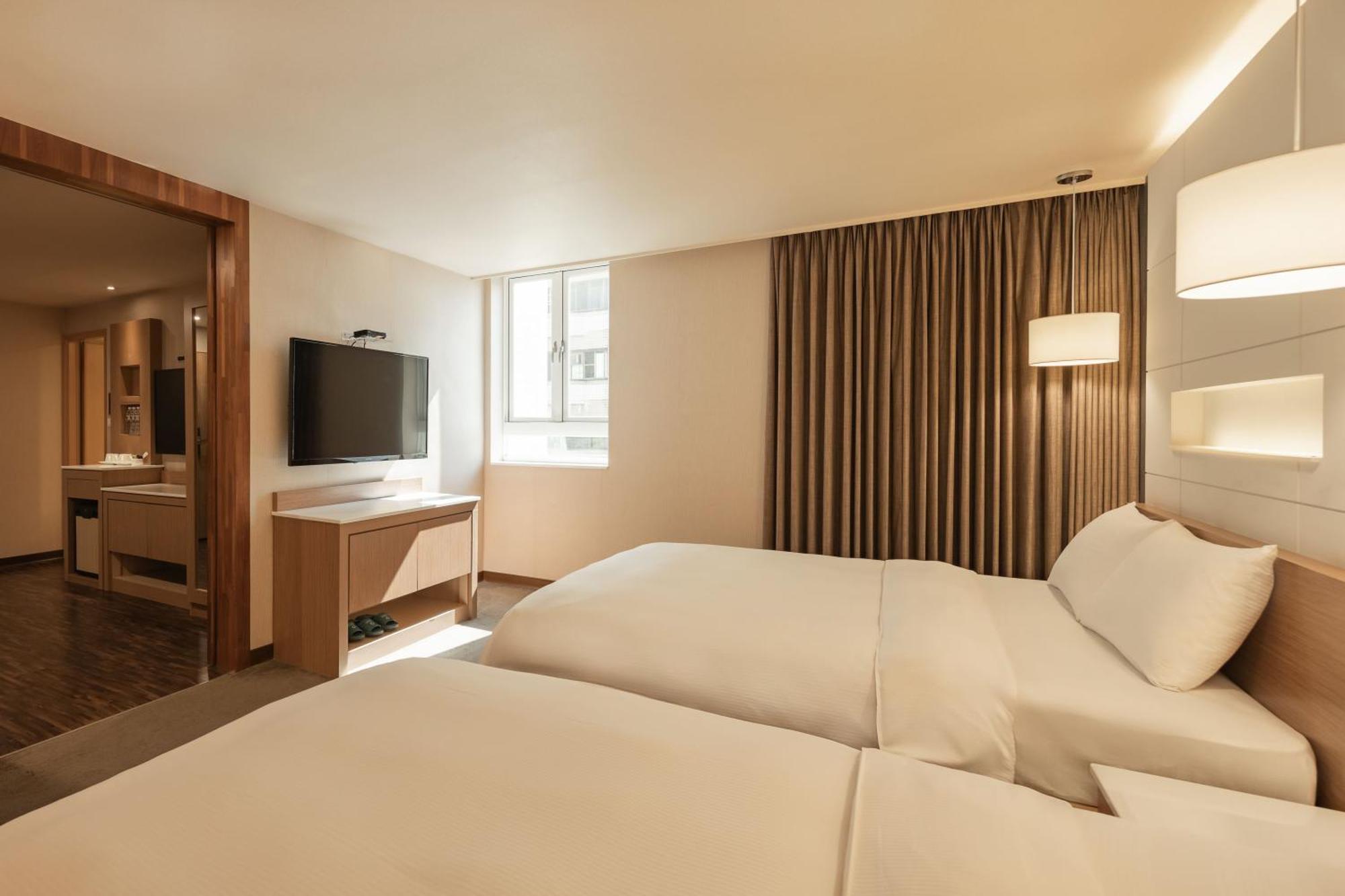 Kindness Hotel - Sandou II Kaohsiung Quarto foto